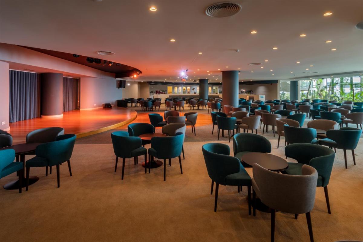 Uma área de estar em Enotel Lido - All Inclusive