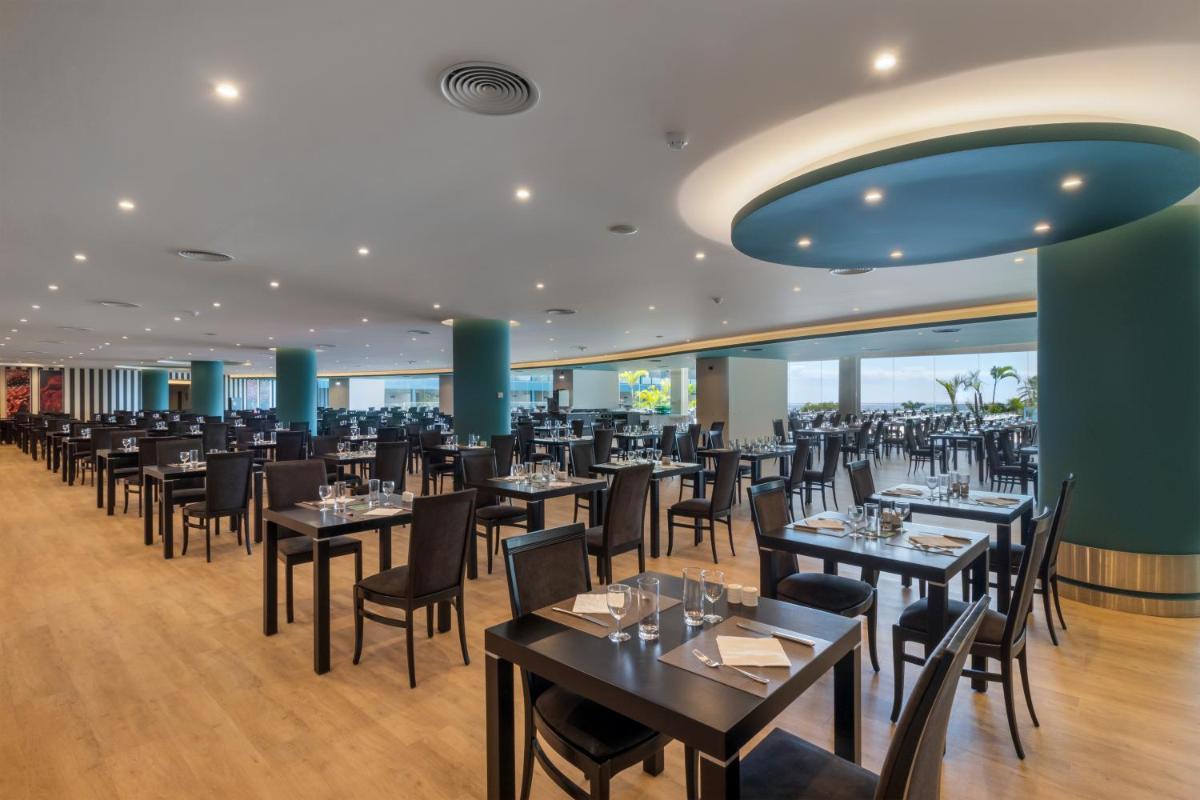 Um restaurante ou outro lugar para comer em Enotel Lido - All Inclusive