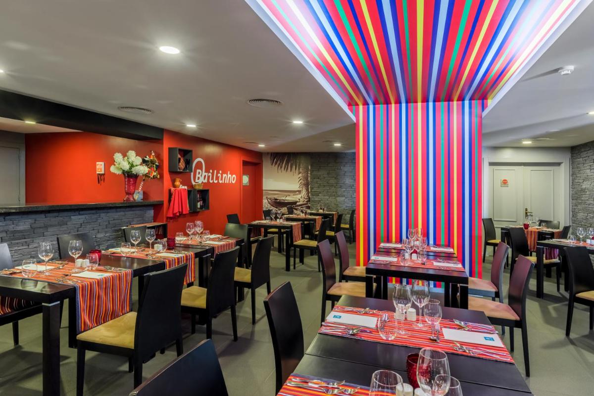 Um restaurante ou outro lugar para comer em Enotel Lido - All Inclusive