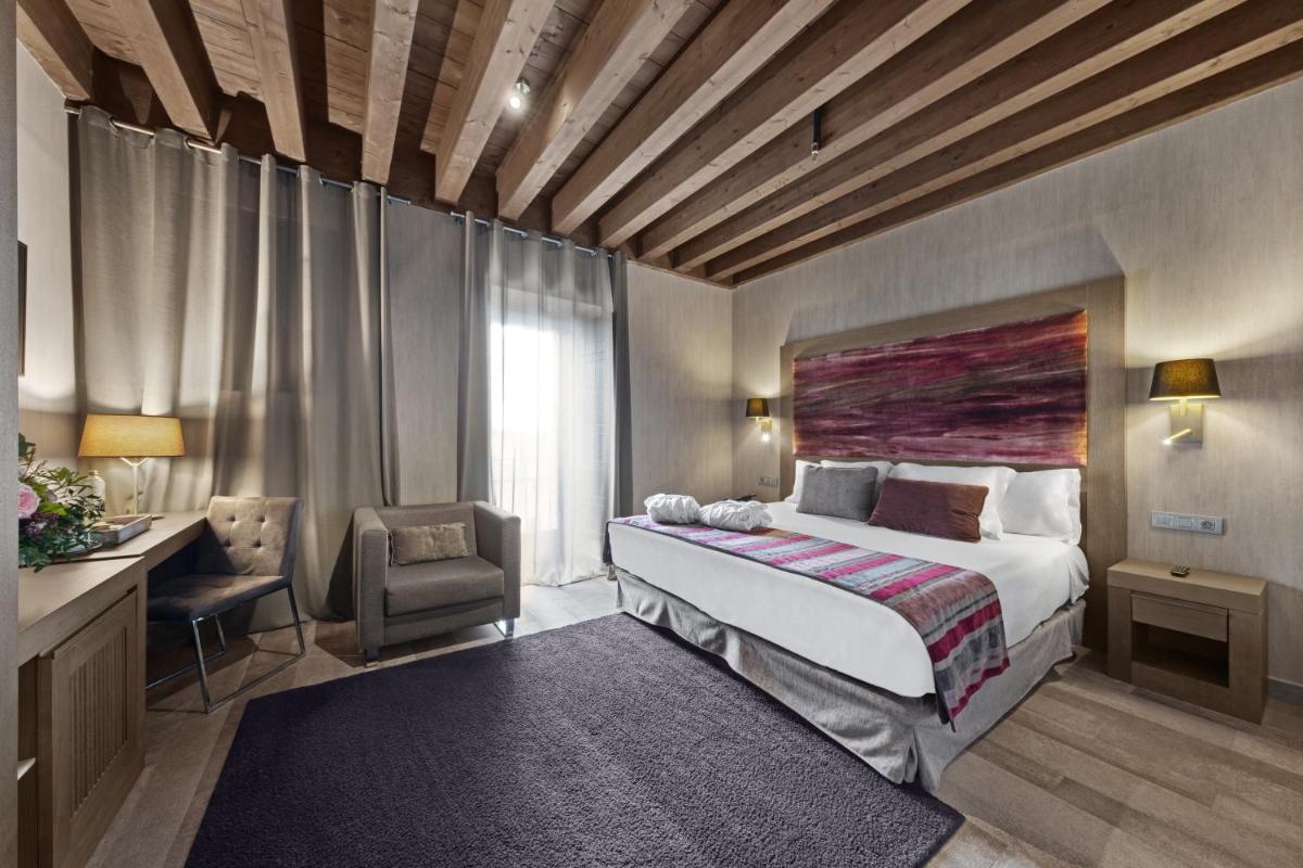 Cama o camas de una habitación en Castilla Termal Monasterio de Valbuena