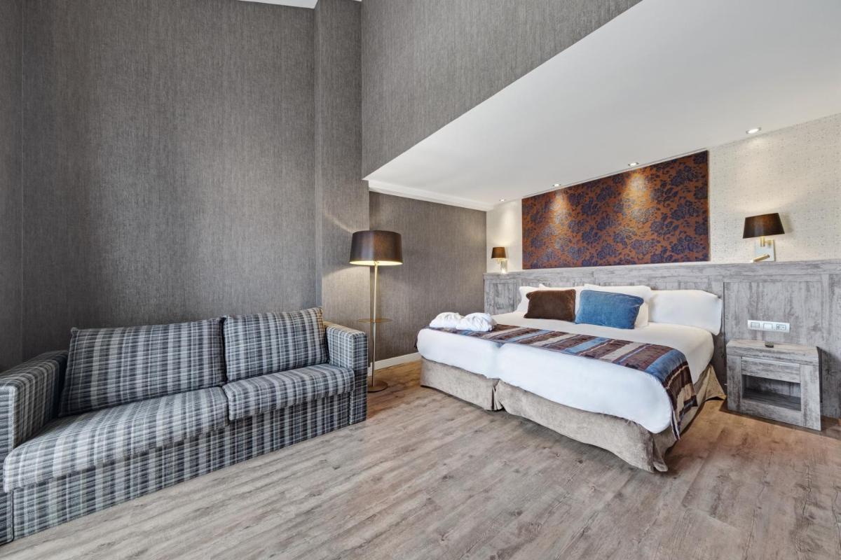 Cama o camas de una habitación en Castilla Termal Monasterio de Valbuena