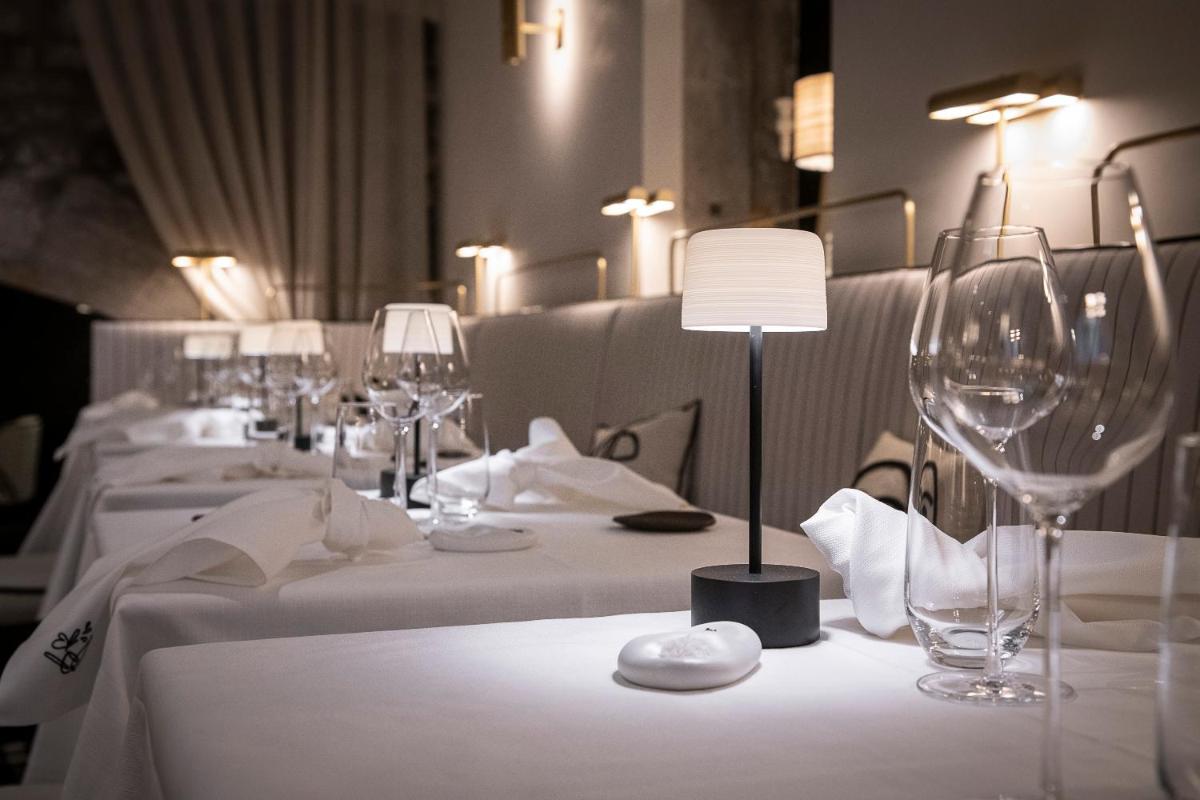 Restaurant ou autre lieu de restauration dans l'établissement Petit Hôtel Confidentiel