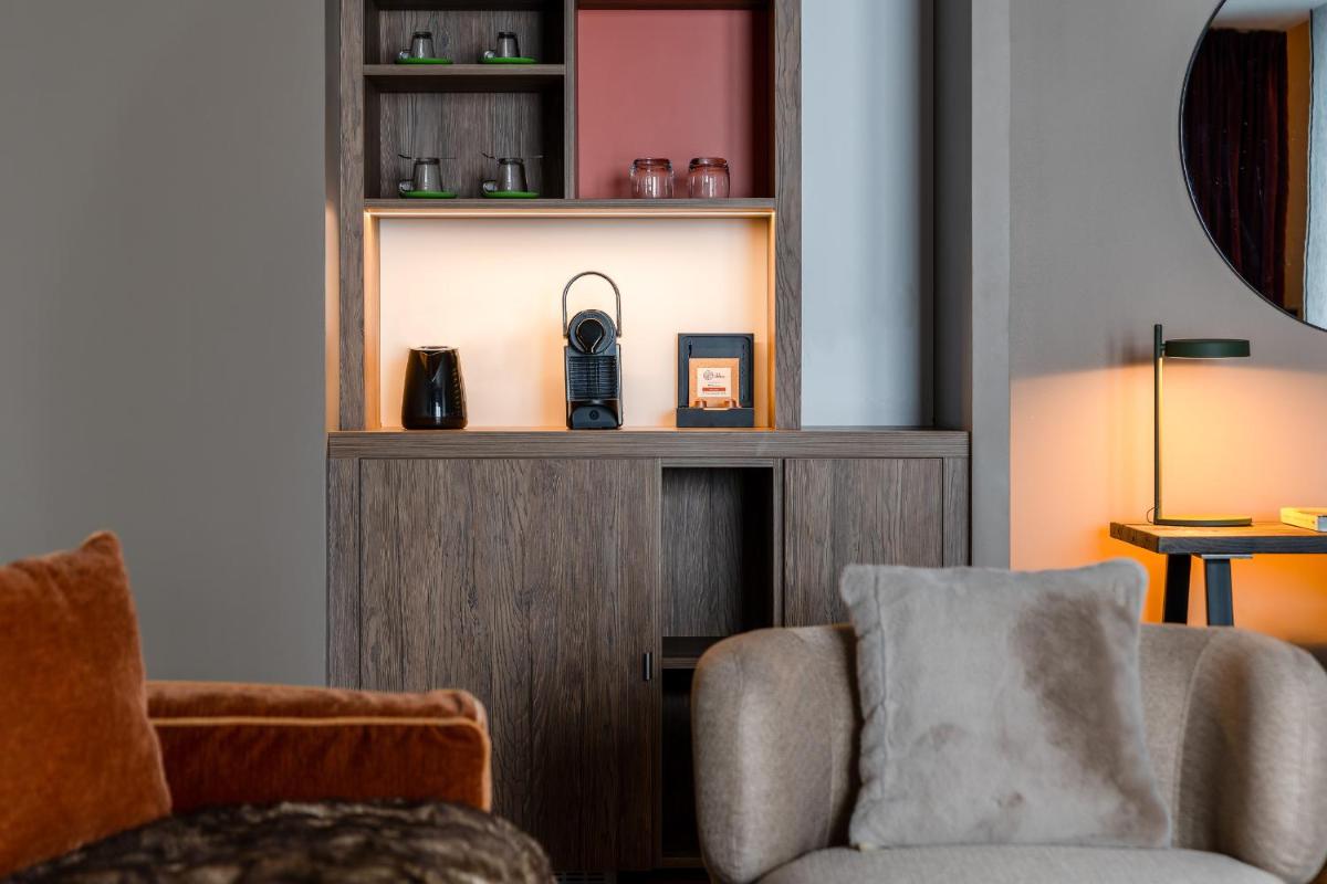 Coin salon dans l'établissement ILY Hotels & Spa La Rosiere