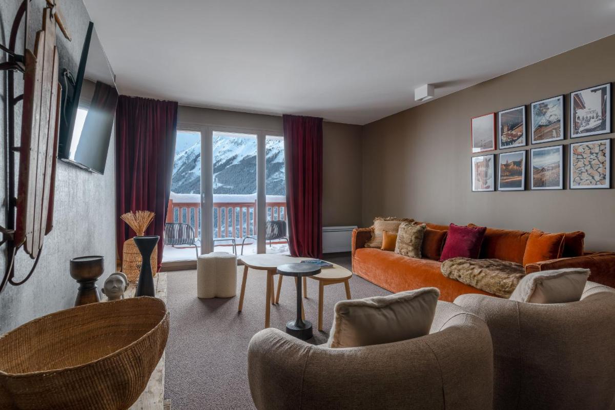 Coin salon dans l'établissement ILY Hotels & Spa La Rosiere