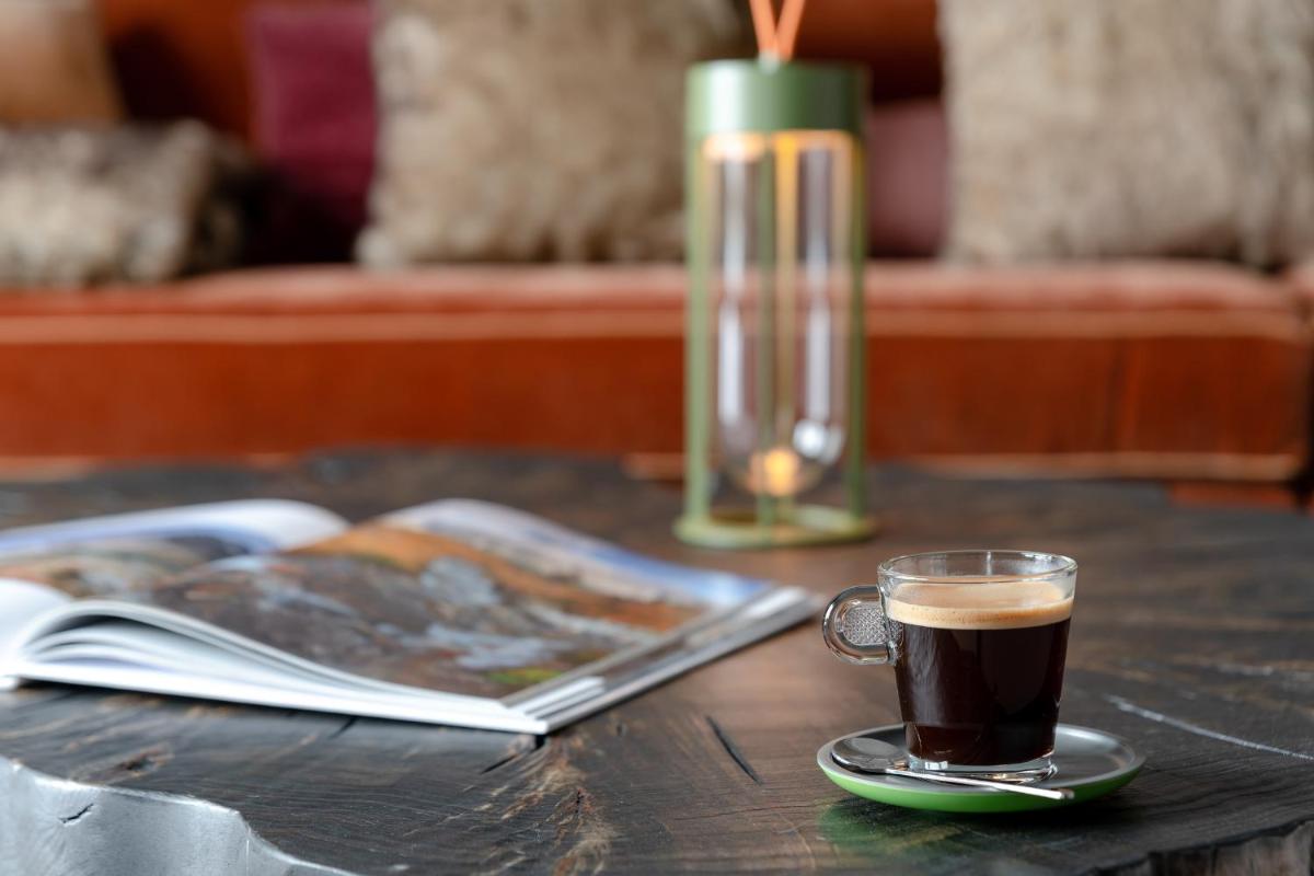 Boissons dans l'établissement ILY Hotels & Spa La Rosiere