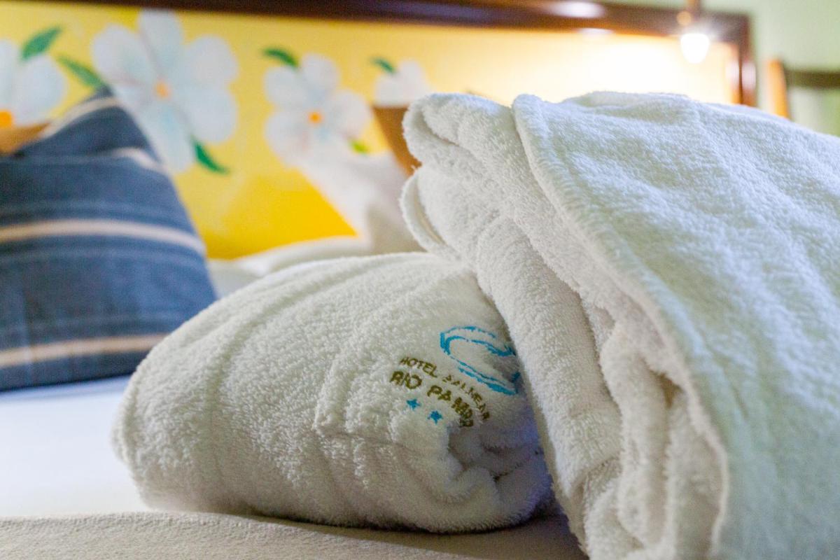 Cama o camas de una habitación en Hotel Balneario Río Pambre