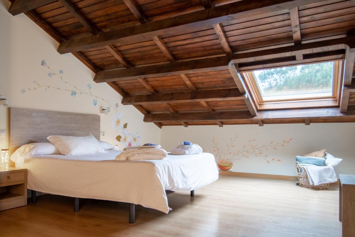 Cama o camas de una habitación en Hotel Balneario Río Pambre