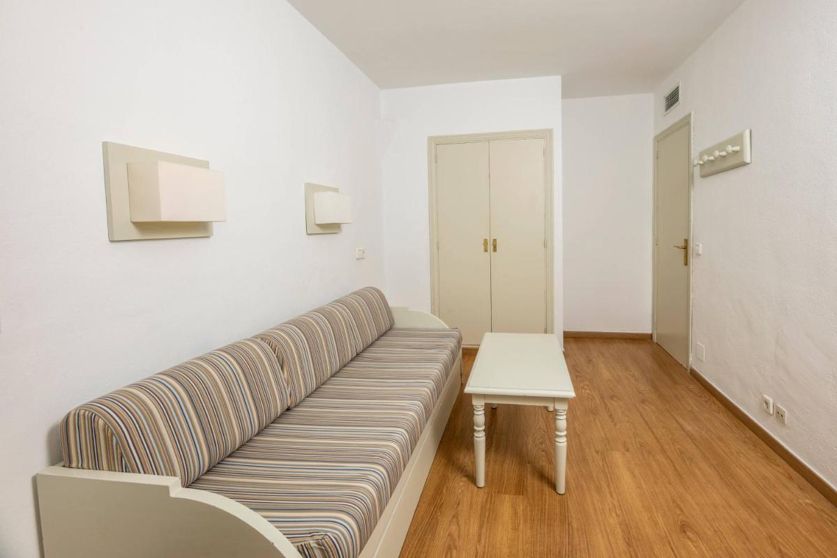 Zona de estar de Hotel Club Es Talaial
