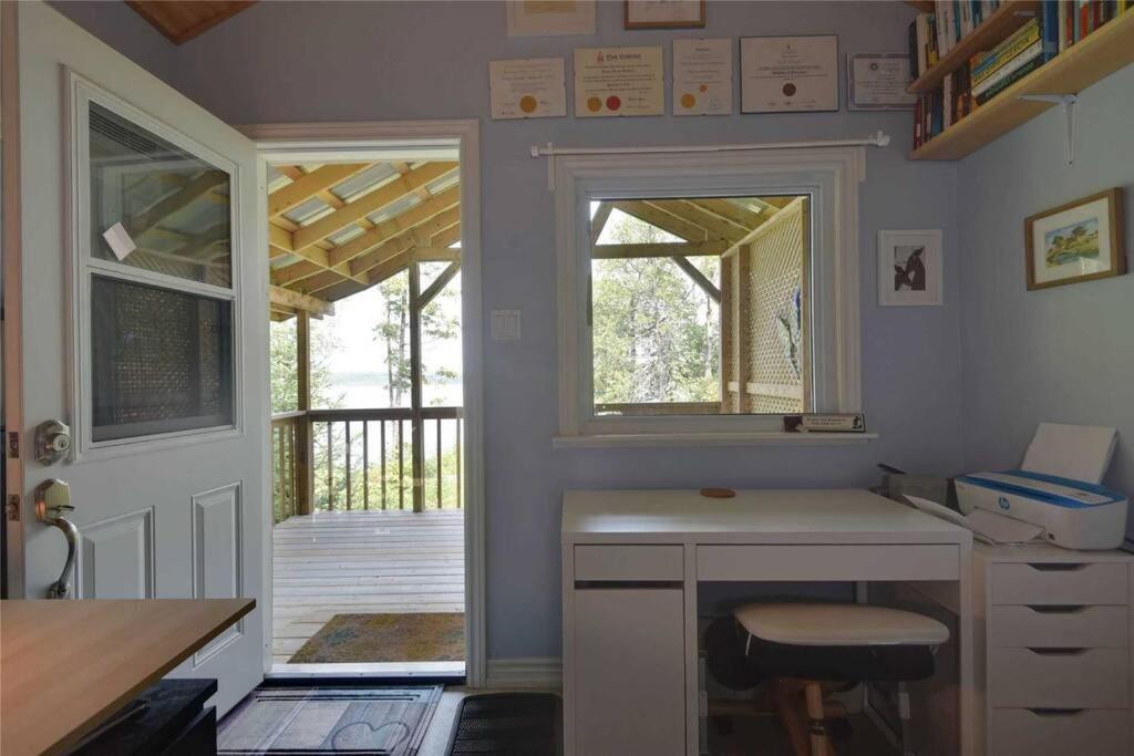 Private Sandy Beach Waterfront Cottage - Housity
