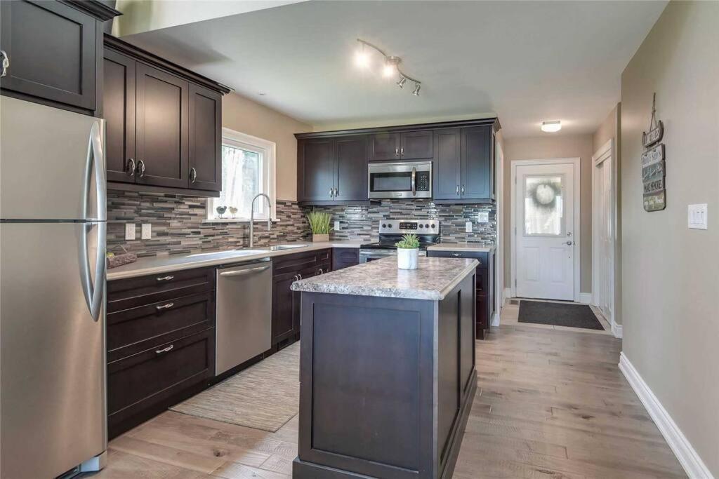 Private Sandy Beach Waterfront Cottage - Housity