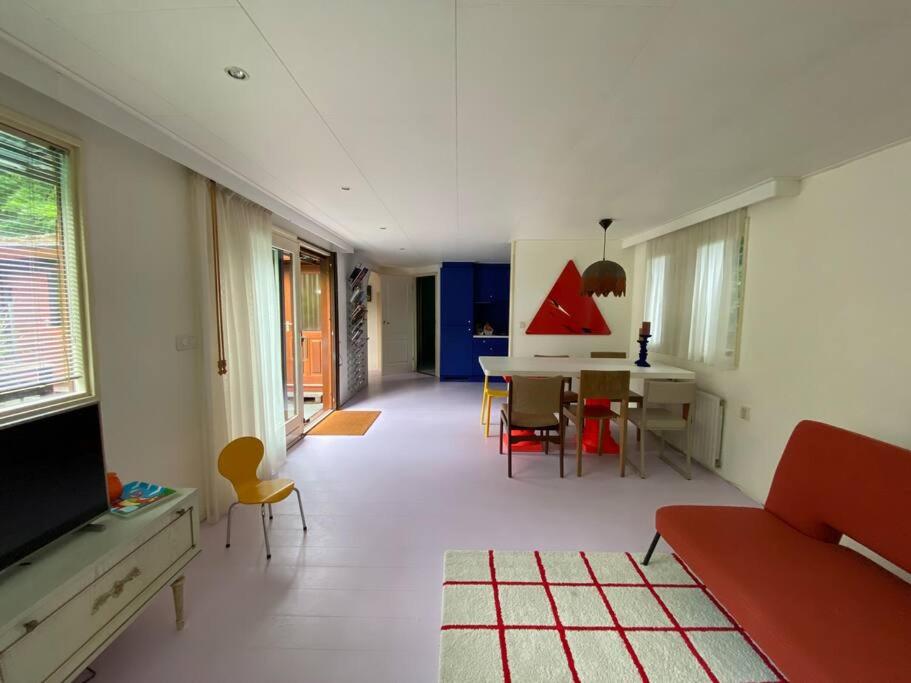 Kleurrijk huisje voor 5-personen op de Veluwe - Housity
