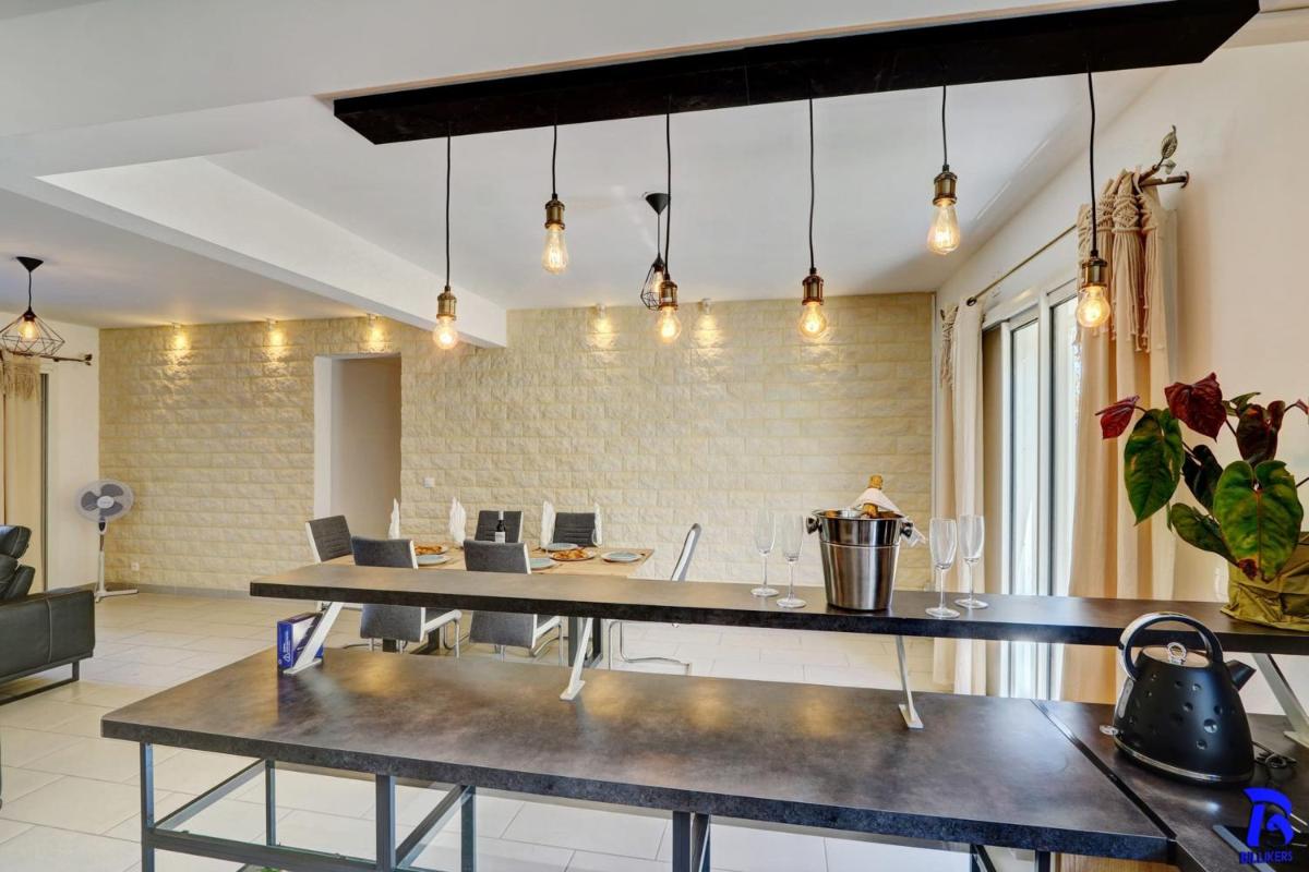 Appartement Ô COEUR DU NORD, classé 4 étoiles, rez-de-chaussée, jardin, 4 personnes, Sainte Clotilde, Saint Denis - Housity