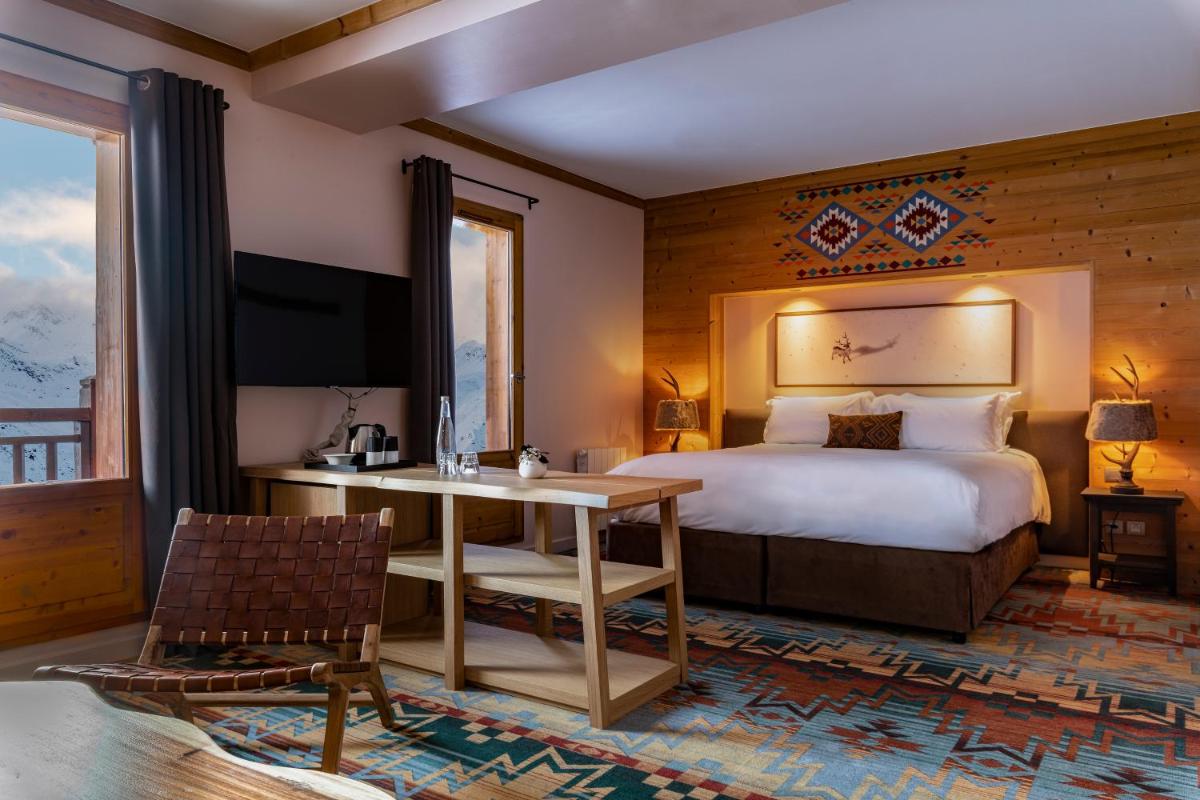 Un ou plusieurs lits dans un hébergement de l'établissement Chalet Hotel Kaya