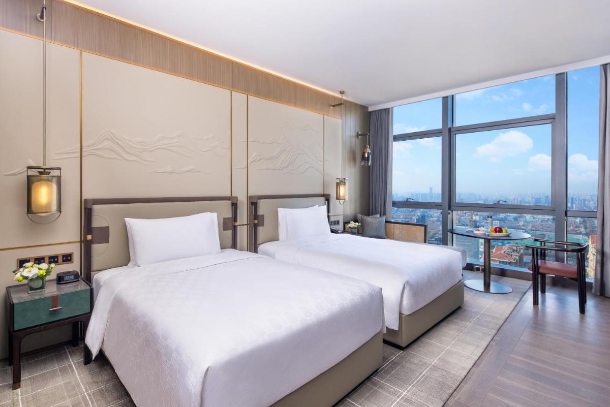 HUALUXE Hotels and Resorts Qingdao Licang - Housity