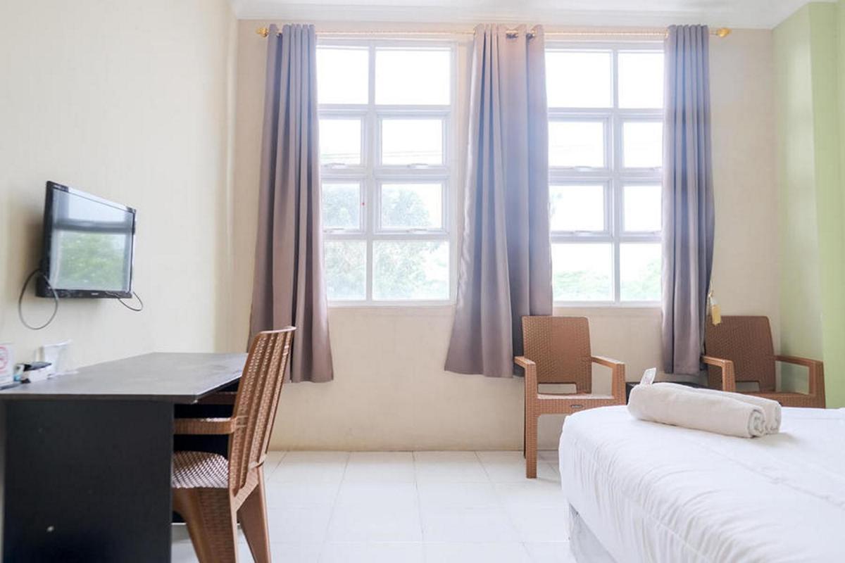 Urbanview Hotel Ta Ke Jelutung Puncak Jambi - Housity