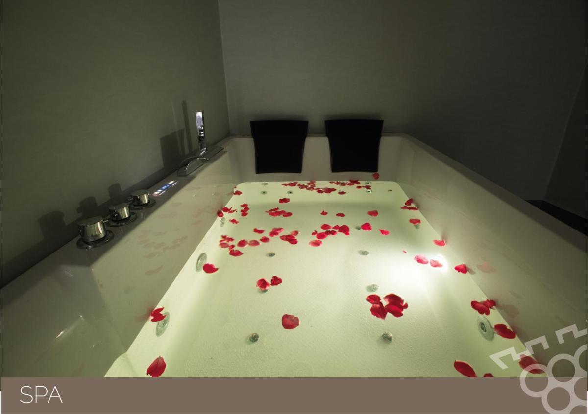 Uma cama ou camas num quarto em Douro Castelo Signature Hotel & Spa