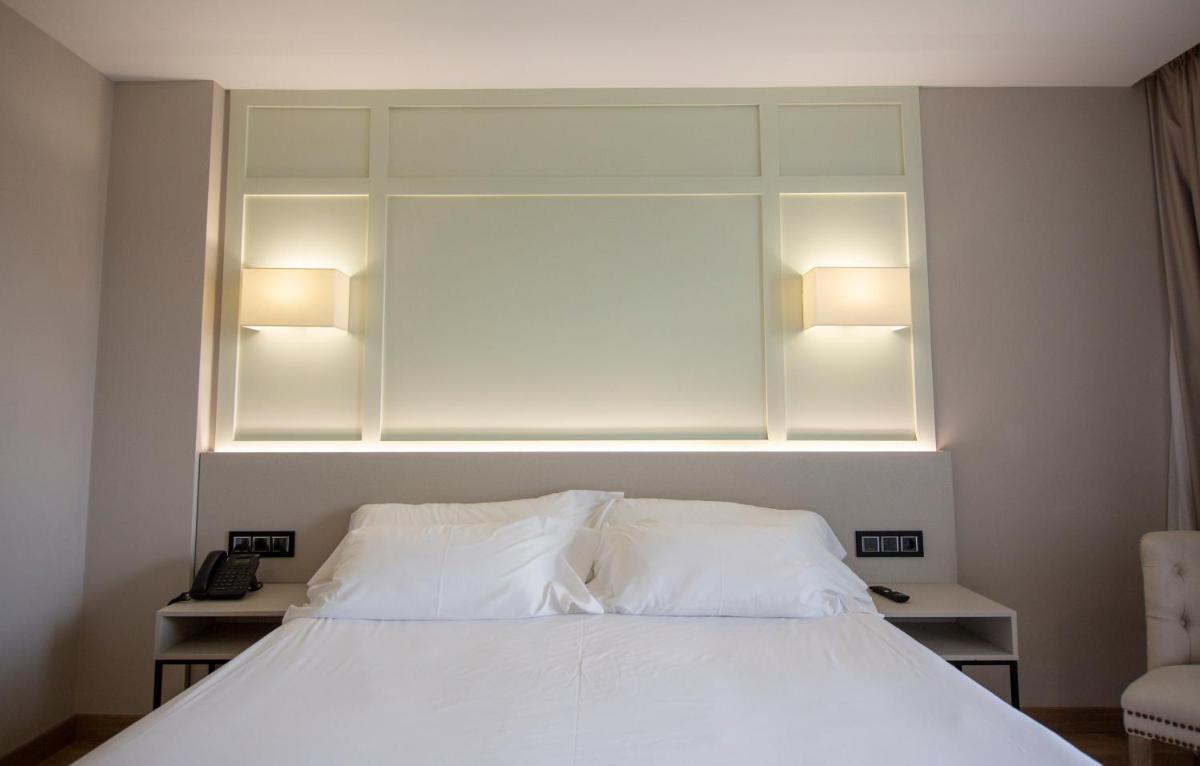 Cama o camas de una habitación en Oca Playa de Foz Hotel & Spa