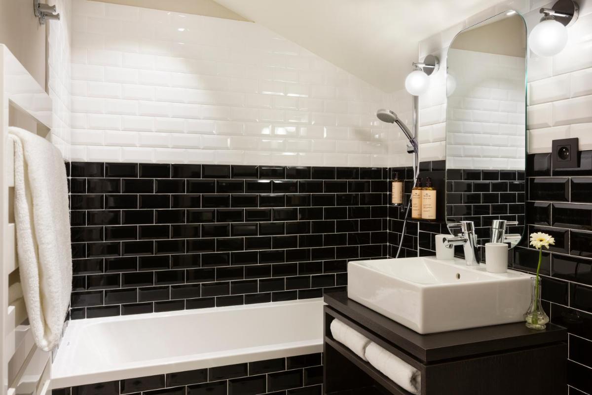 Salle de bains dans l'établissement Ours Blanc Hotel & Spa