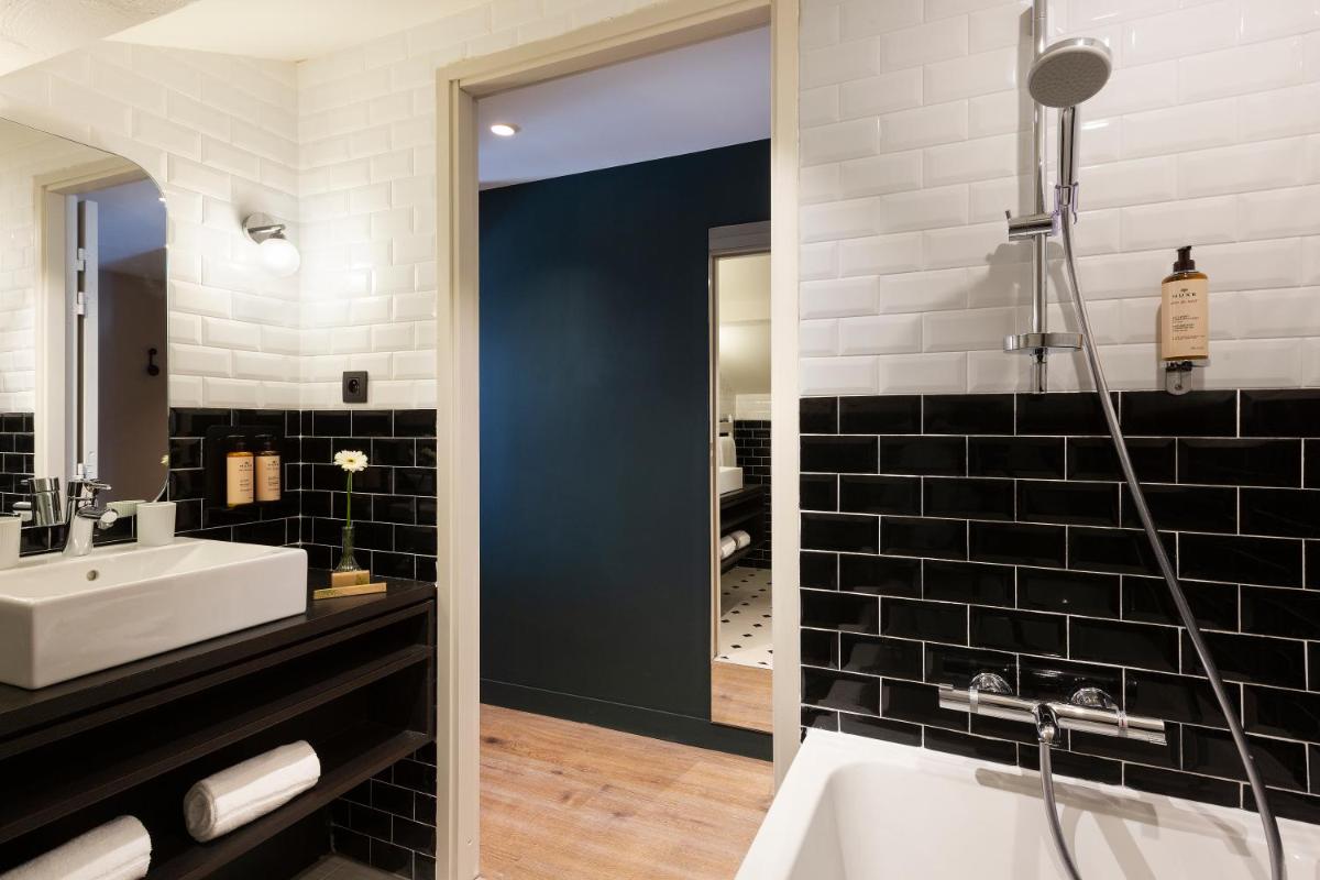 Salle de bains dans l'établissement Ours Blanc Hotel & Spa