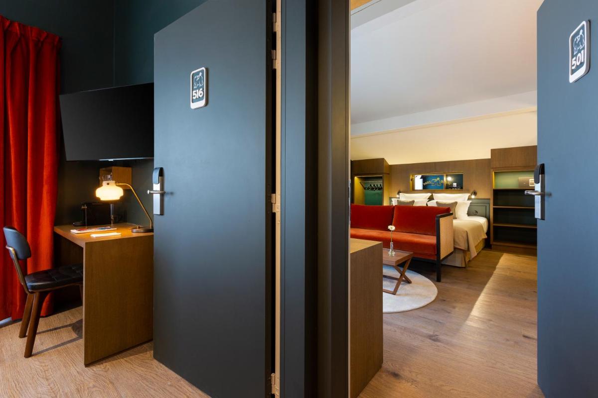 Un ou plusieurs lits dans un hébergement de l'établissement Ours Blanc Hotel & Spa