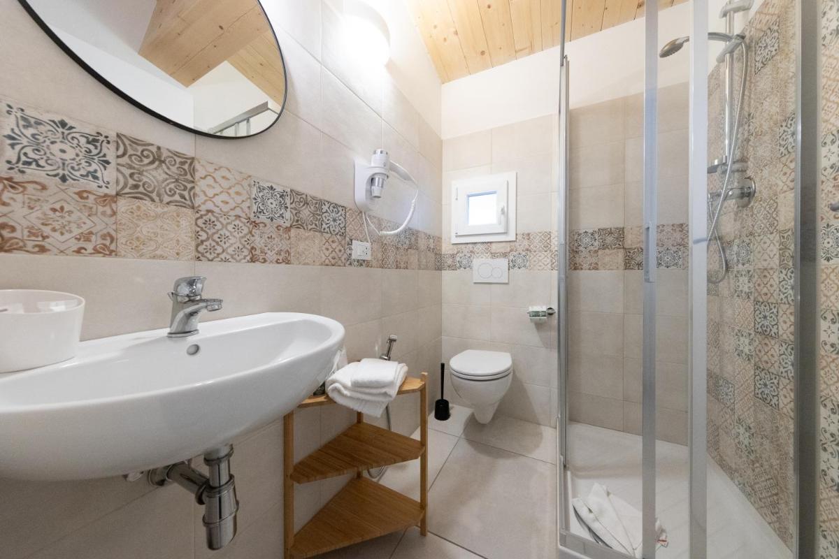 Via Siena 4 - Suites & Rooms - Housity