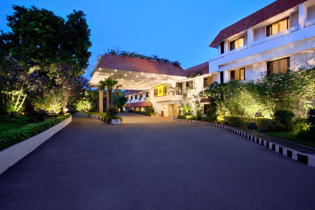 a driveway in front of a building at night at Trident Chennai in Chennai