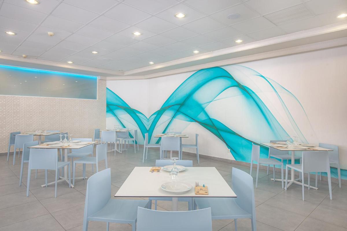 Un restaurante o sitio para comer en Gran Hotel Las Fuentes