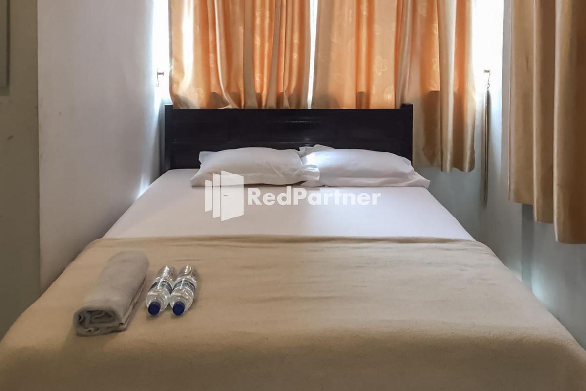 Aquino Marito Homestay Mitra RedDoorz - Housity
