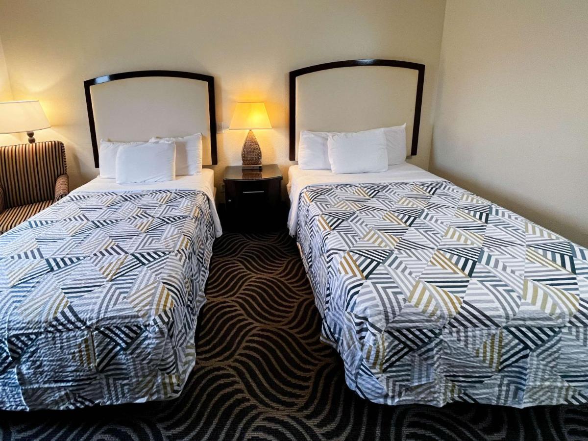 Executive Inn & Suites Breaux Bridge, LA - Housity