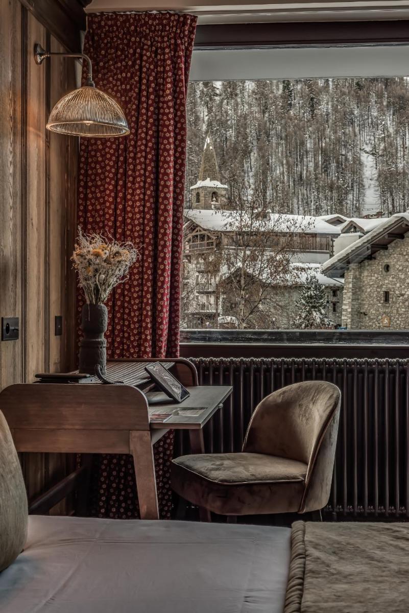 Coin salon dans l'établissement Hotel & Spa Le Val d'Isère