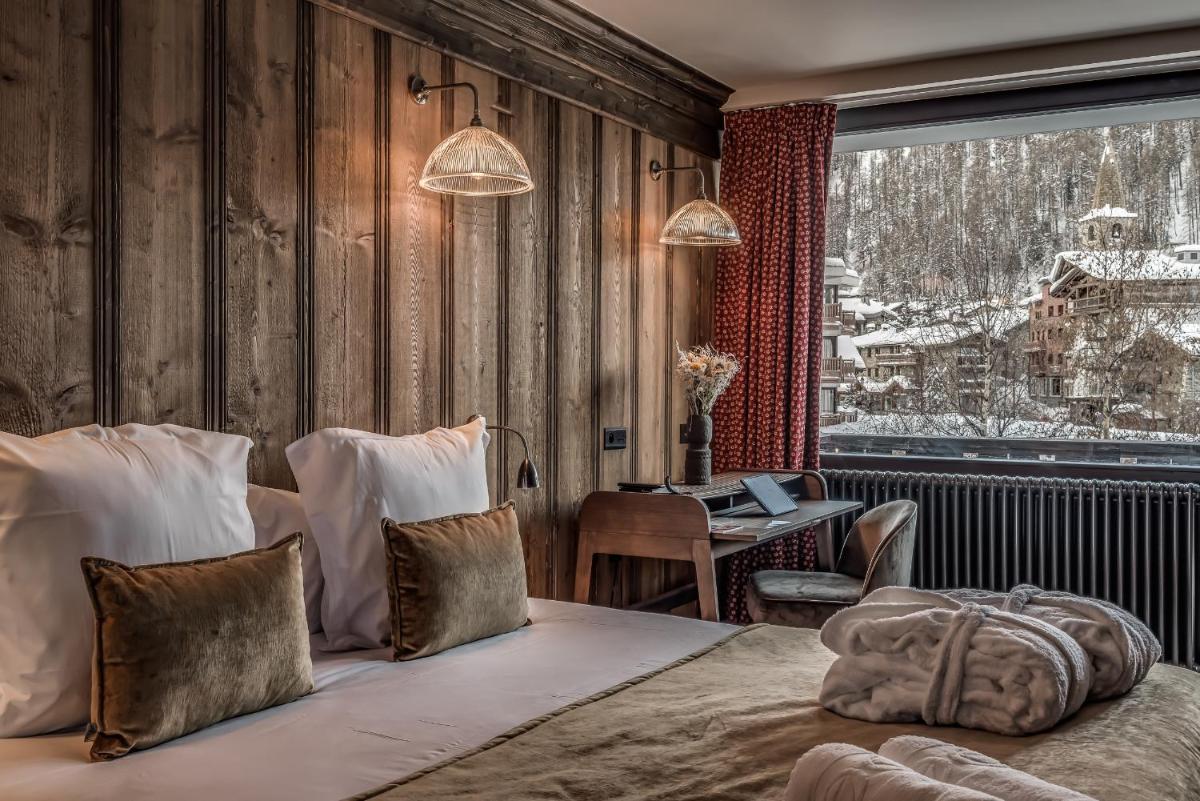 Coin salon dans l'établissement Hotel & Spa Le Val d'Isère