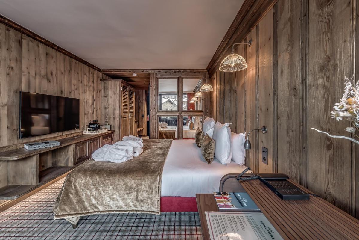 Un ou plusieurs lits dans un hébergement de l'établissement Hotel & Spa Le Val d'Isère