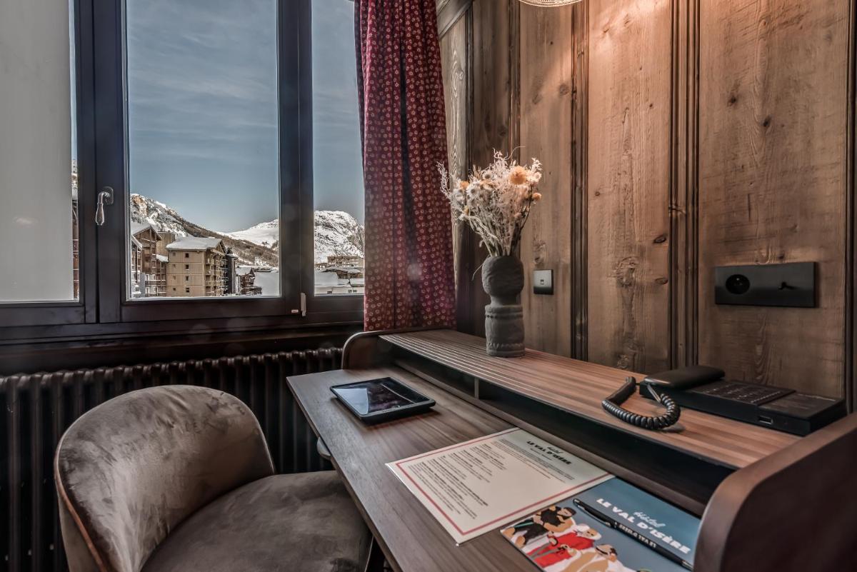 Coin salon dans l'établissement Hotel & Spa Le Val d'Isère