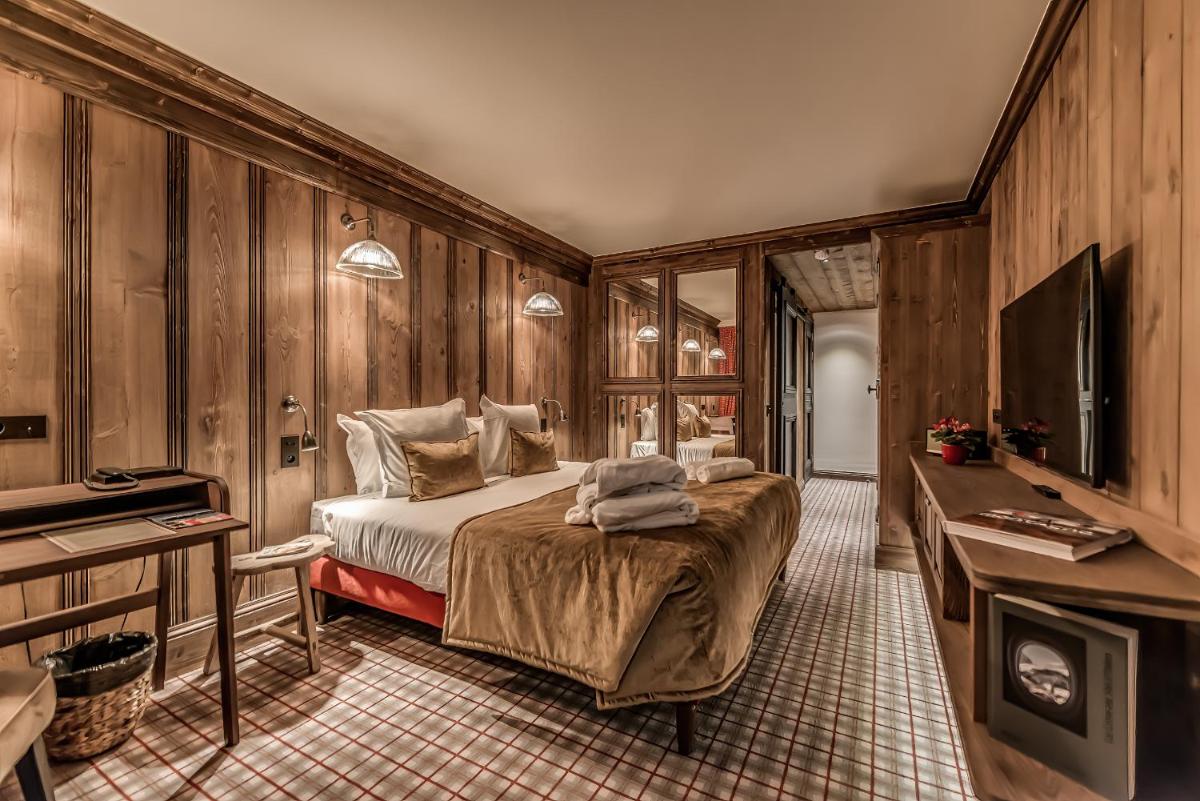 Télévision ou salle de divertissement dans l'établissement Hotel & Spa Le Val d'Isère