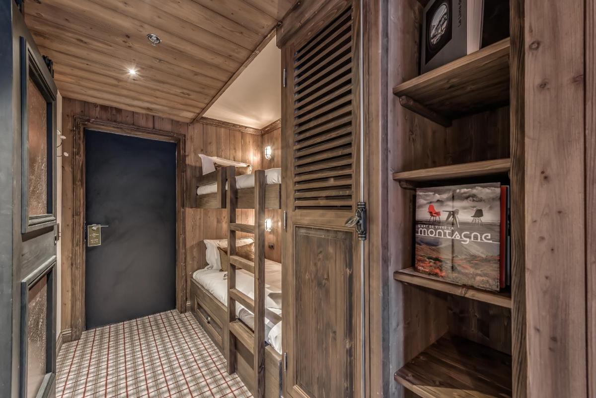 Un ou plusieurs lits dans un hébergement de l'établissement Hotel & Spa Le Val d'Isère