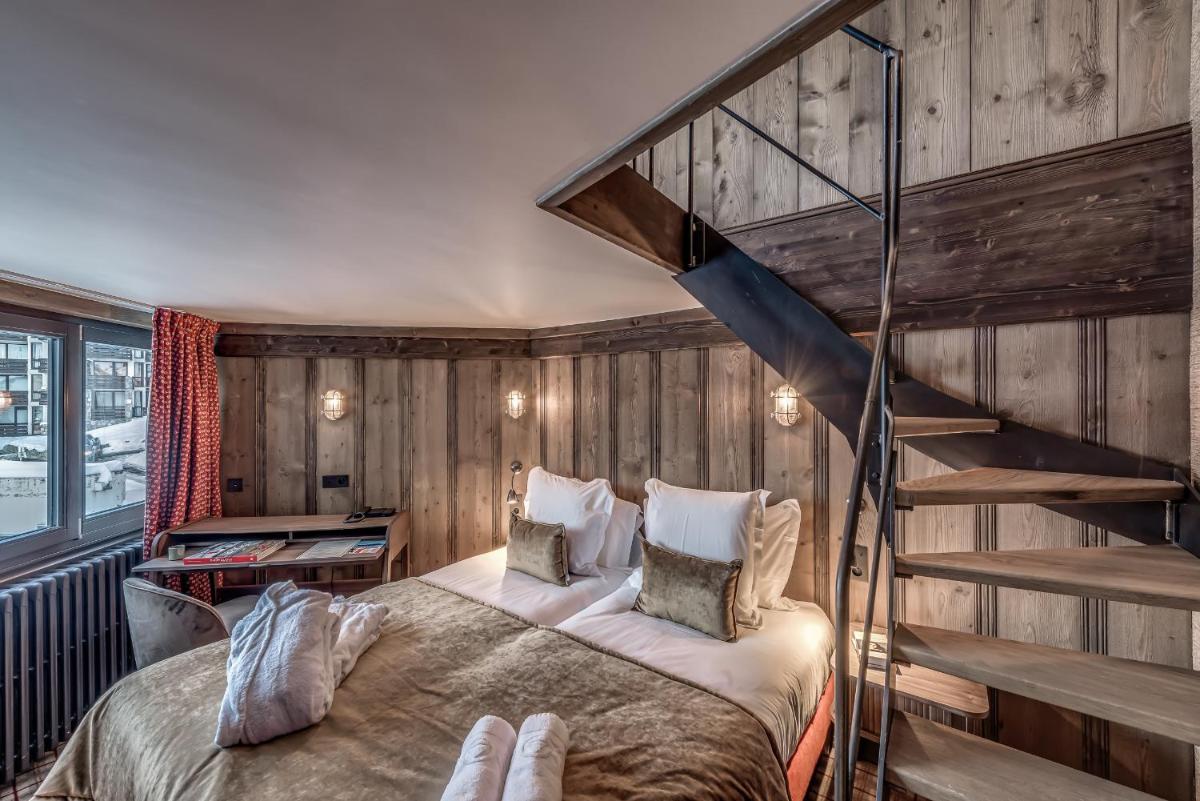 Un ou plusieurs lits dans un hébergement de l'établissement Hotel & Spa Le Val d'Isère