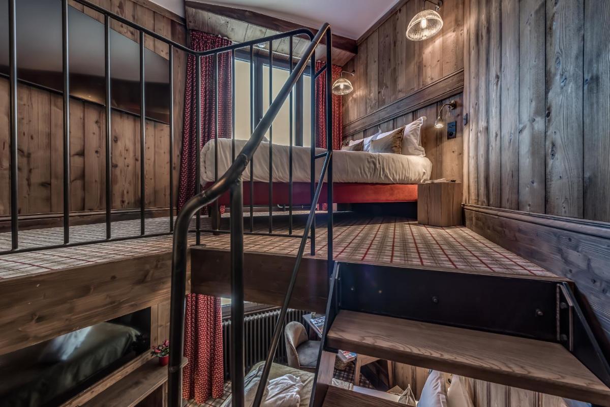 Un ou plusieurs lits dans un hébergement de l'établissement Hotel & Spa Le Val d'Isère