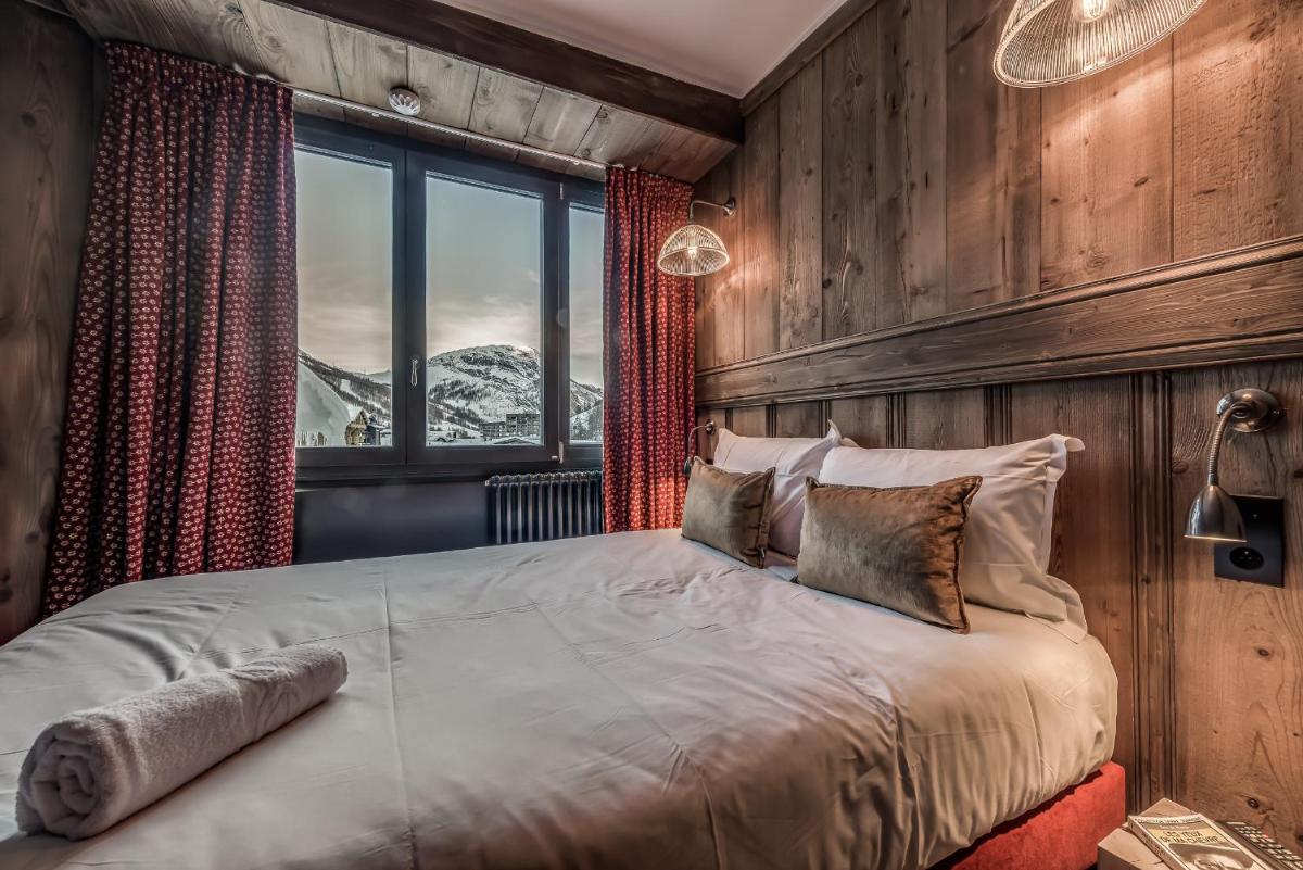 Un ou plusieurs lits dans un hébergement de l'établissement Hotel & Spa Le Val d'Isère