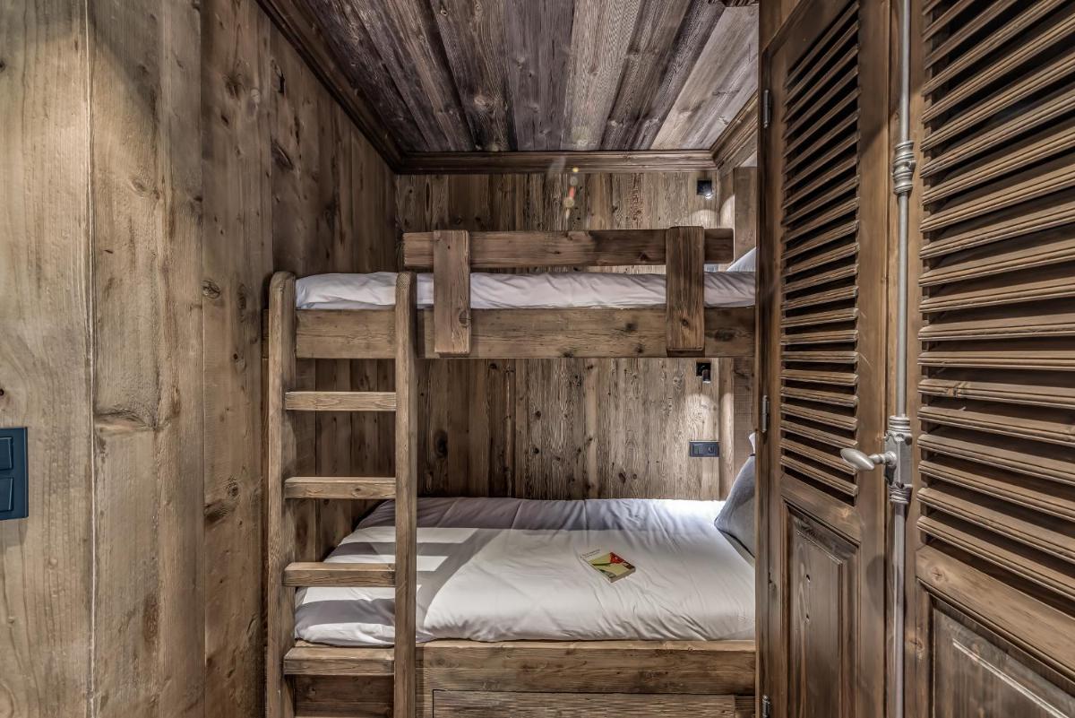 Un ou plusieurs lits dans un hébergement de l'établissement Hotel & Spa Le Val d'Isère