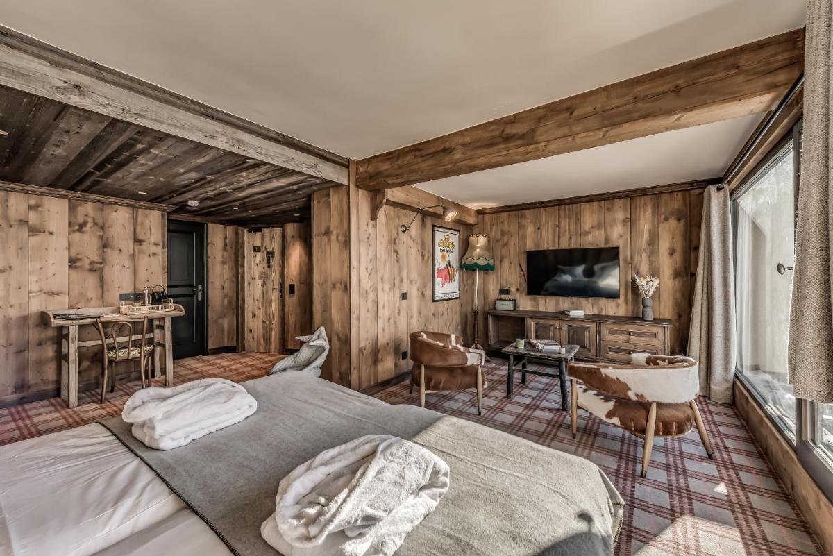 Télévision ou salle de divertissement dans l'établissement Hotel & Spa Le Val d'Isère