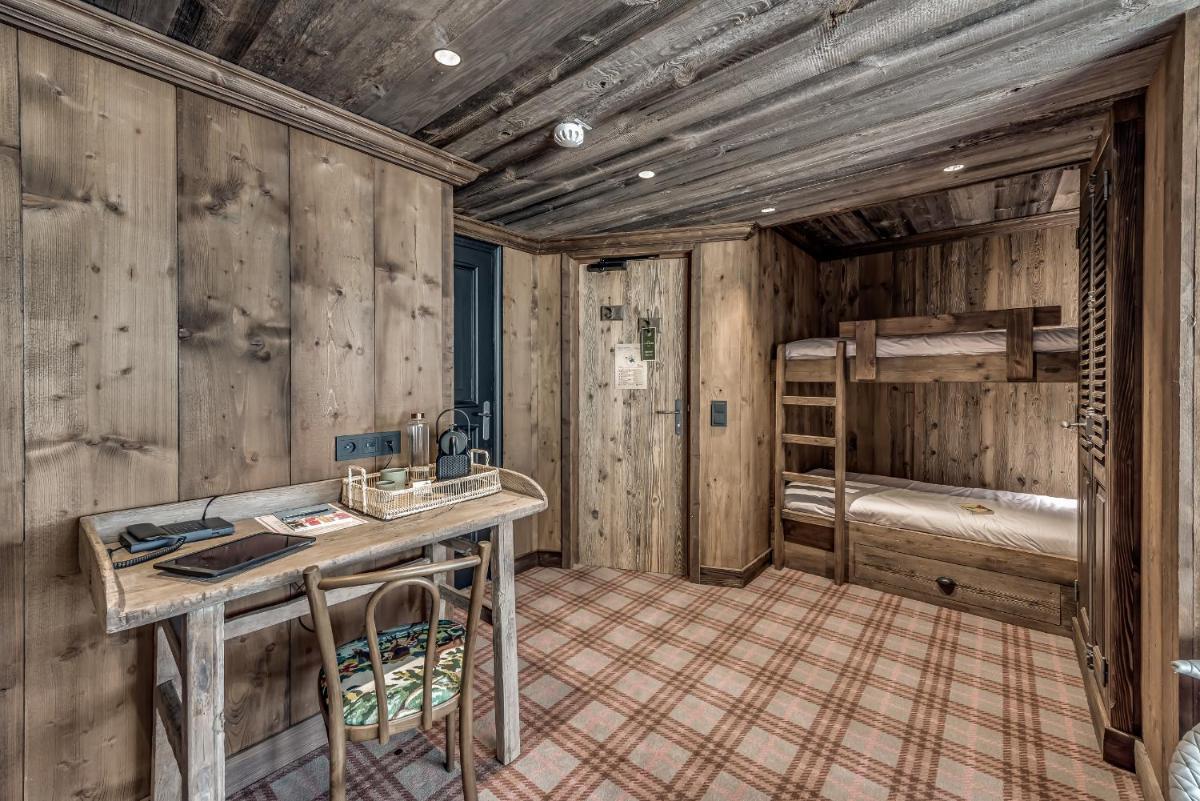 Un ou plusieurs lits dans un hébergement de l'établissement Hotel & Spa Le Val d'Isère