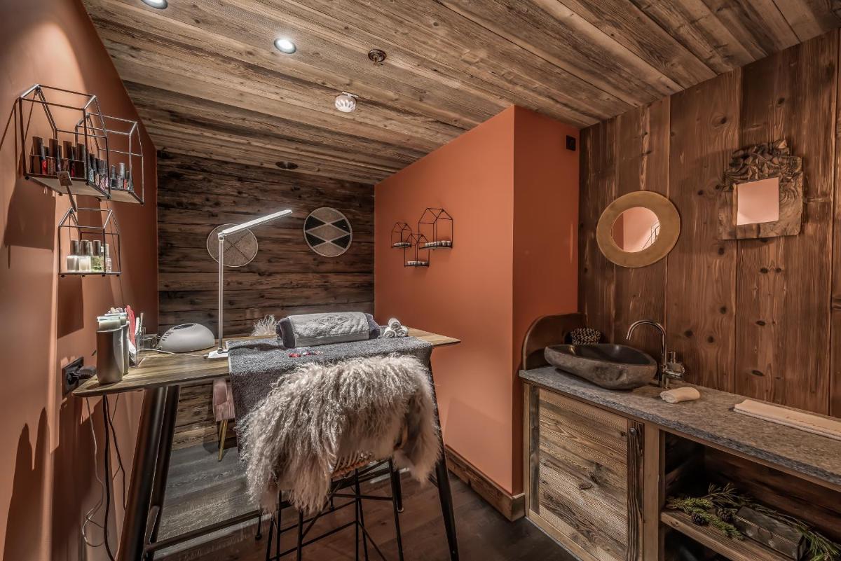 Un ou plusieurs lits dans un hébergement de l'établissement Hotel & Spa Le Val d'Isère
