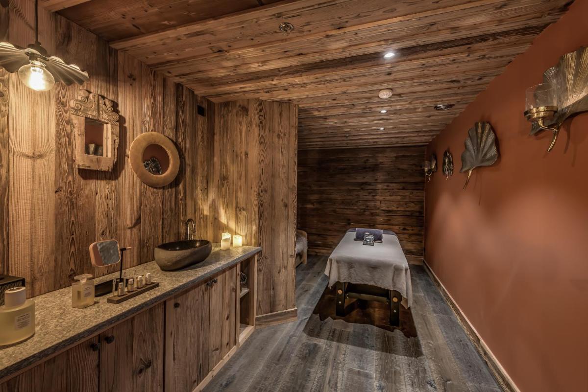 Un ou plusieurs lits dans un hébergement de l'établissement Hotel & Spa Le Val d'Isère