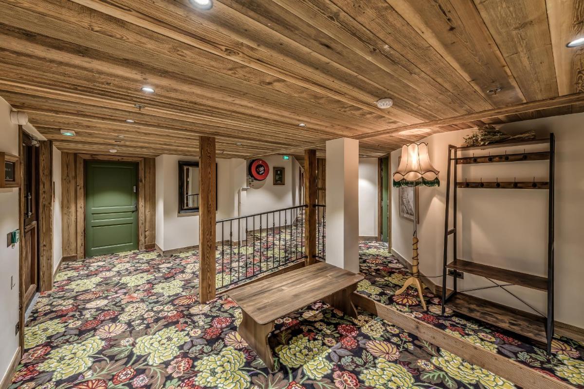 Un ou plusieurs lits dans un hébergement de l'établissement Hotel & Spa Le Val d'Isère