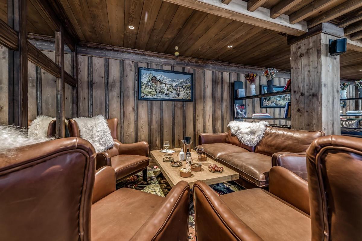 Coin salon dans l'établissement Hotel & Spa Le Val d'Isère