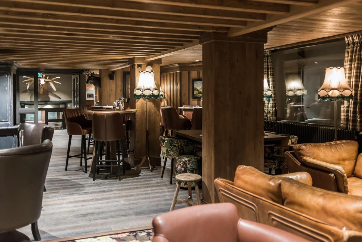 Coin salon dans l'établissement Hotel & Spa Le Val d'Isère