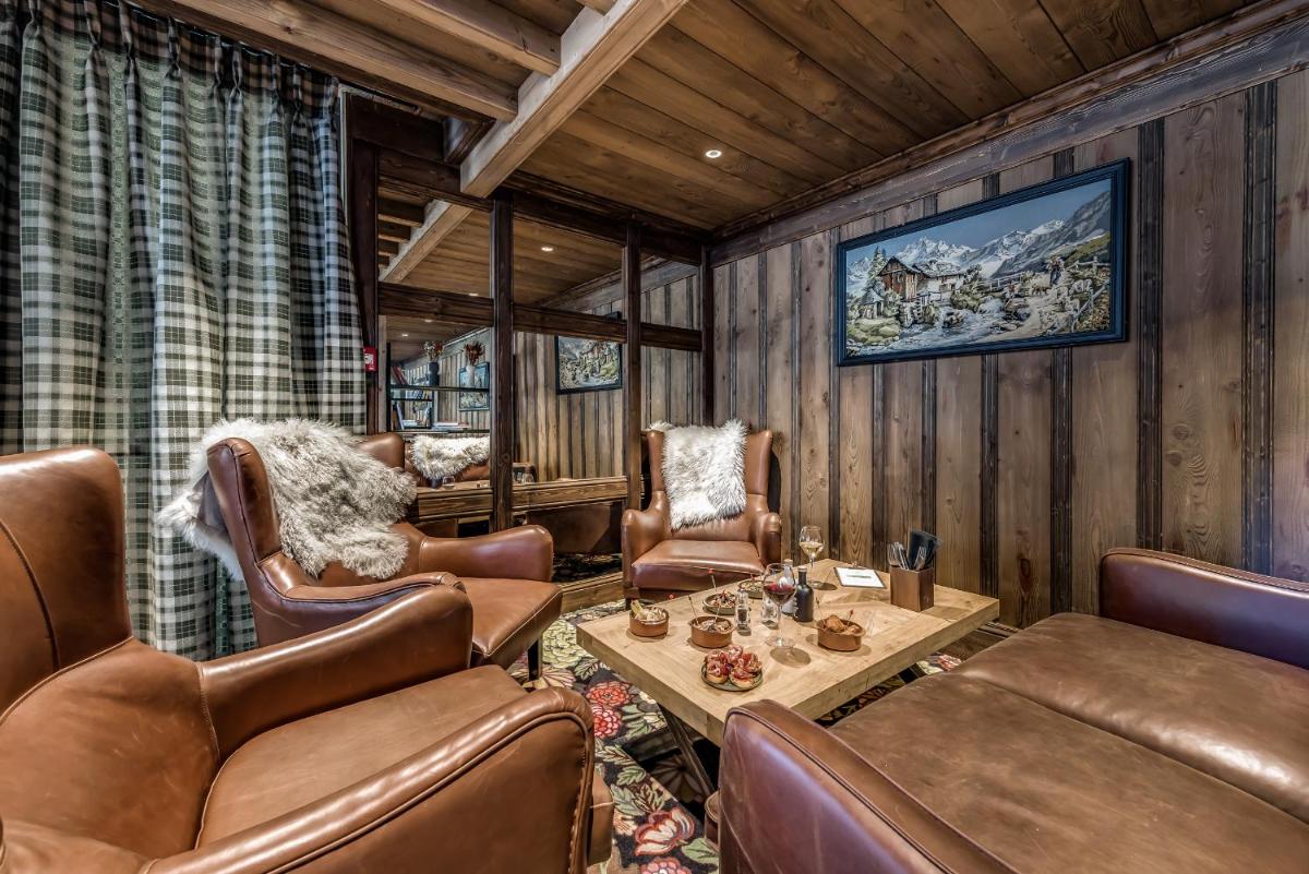 Coin salon dans l'établissement Hotel & Spa Le Val d'Isère
