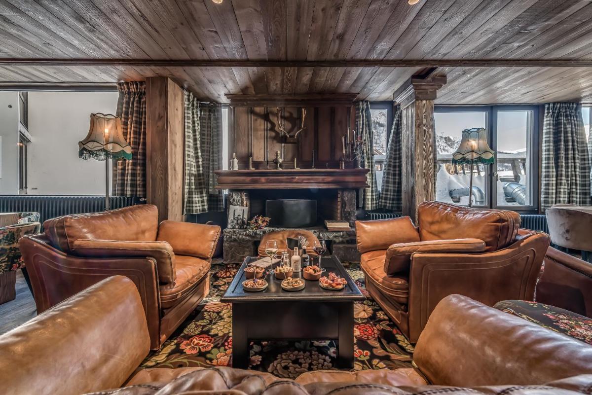 Coin salon dans l'établissement Hotel & Spa Le Val d'Isère