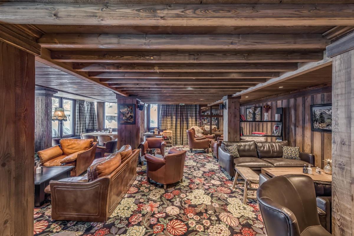 Coin salon dans l'établissement Hotel & Spa Le Val d'Isère