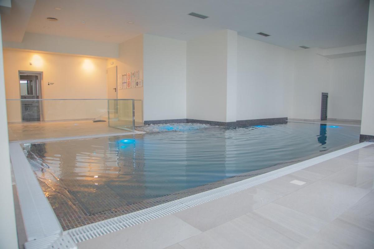 A piscina em ou perto de Calamar Hotel